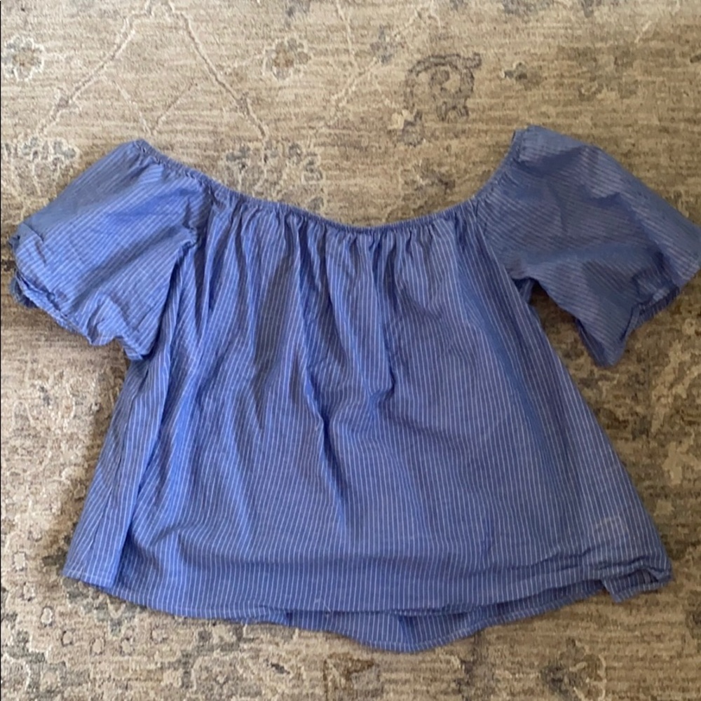 off the shoulder blue shirt